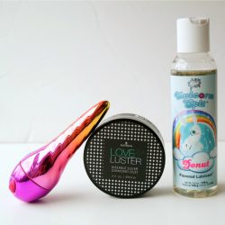 Unicorn vibrator kit with Unihorn bullet, Unicorn lube, and kissable body dust