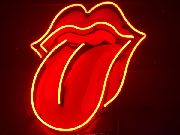 Neon light of lips and tongue