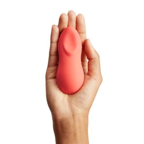 We-Vibe Touch X Coral in hand